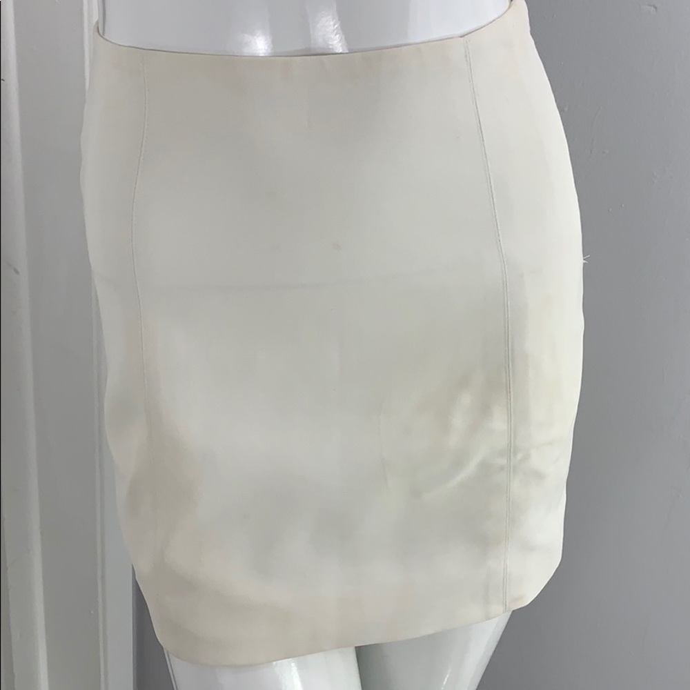 Bebe white mini skirt